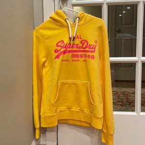 An orange superdry sweatshirt from South Africa